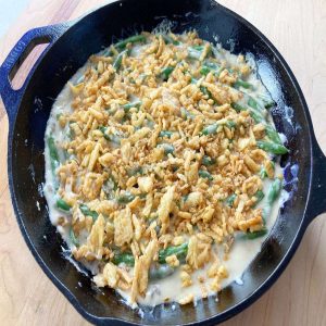 Finished Green Bean Casserole in a Cast Iron Skillet