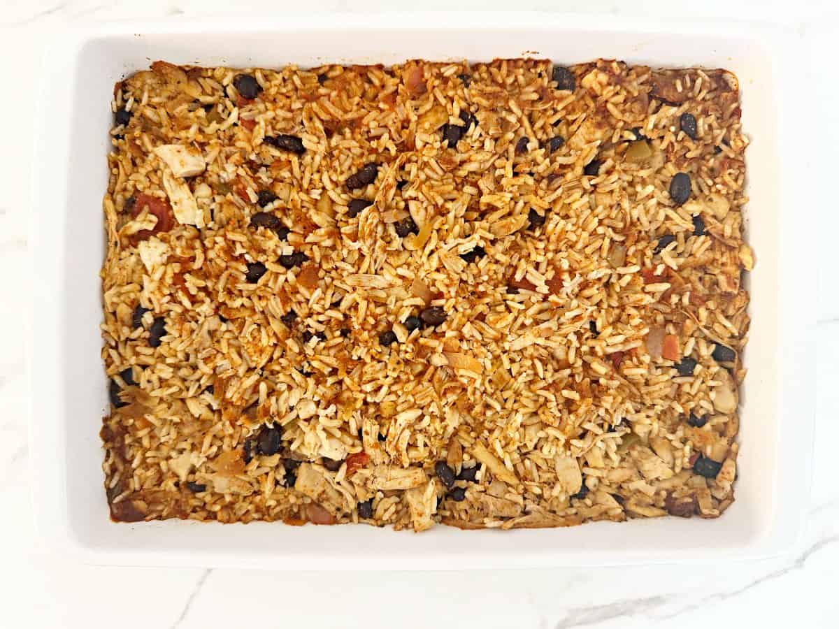 Down view white baking dish with baked casserole.