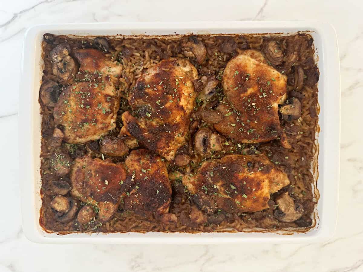 Down view white baking dish with baked casserole.