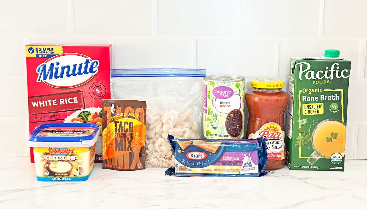 Side view of chicken taco rice casserole ingredients in their packaging.