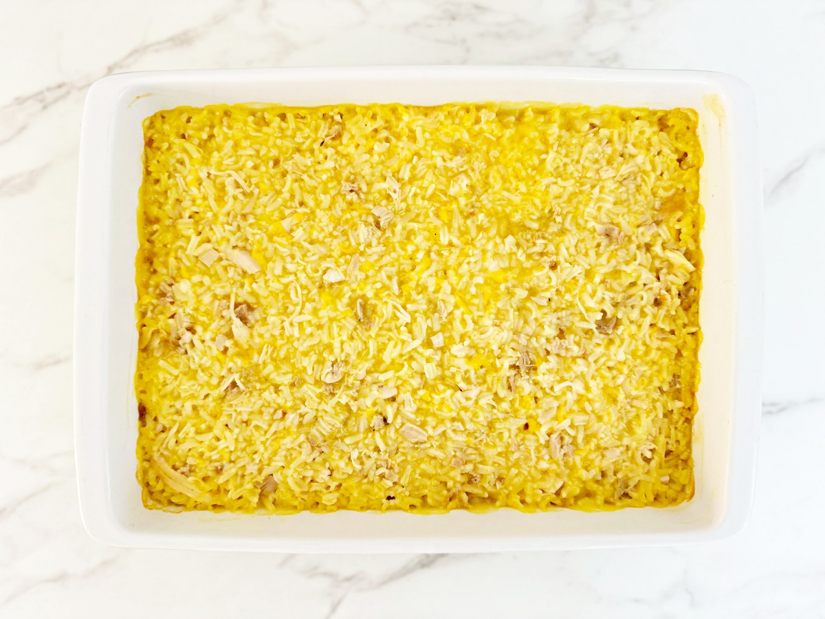 Down view white baking dish with parbaked casserole.