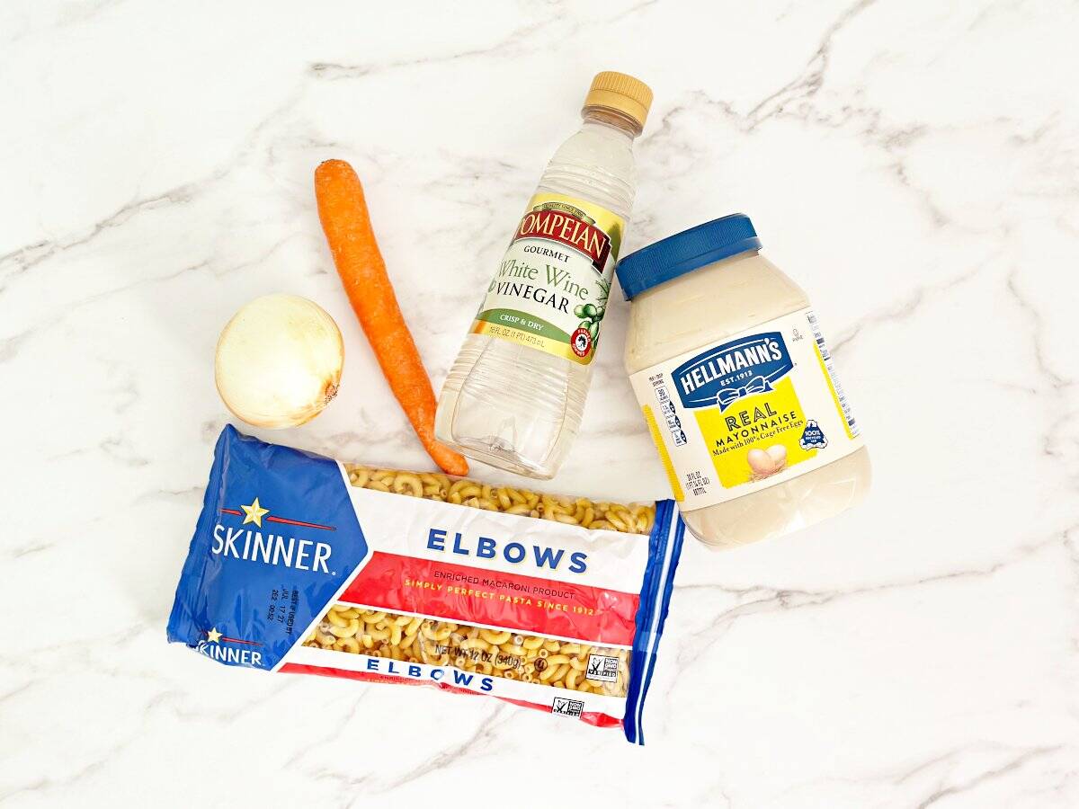 Down view of ingredients in their packaging and vegetables.