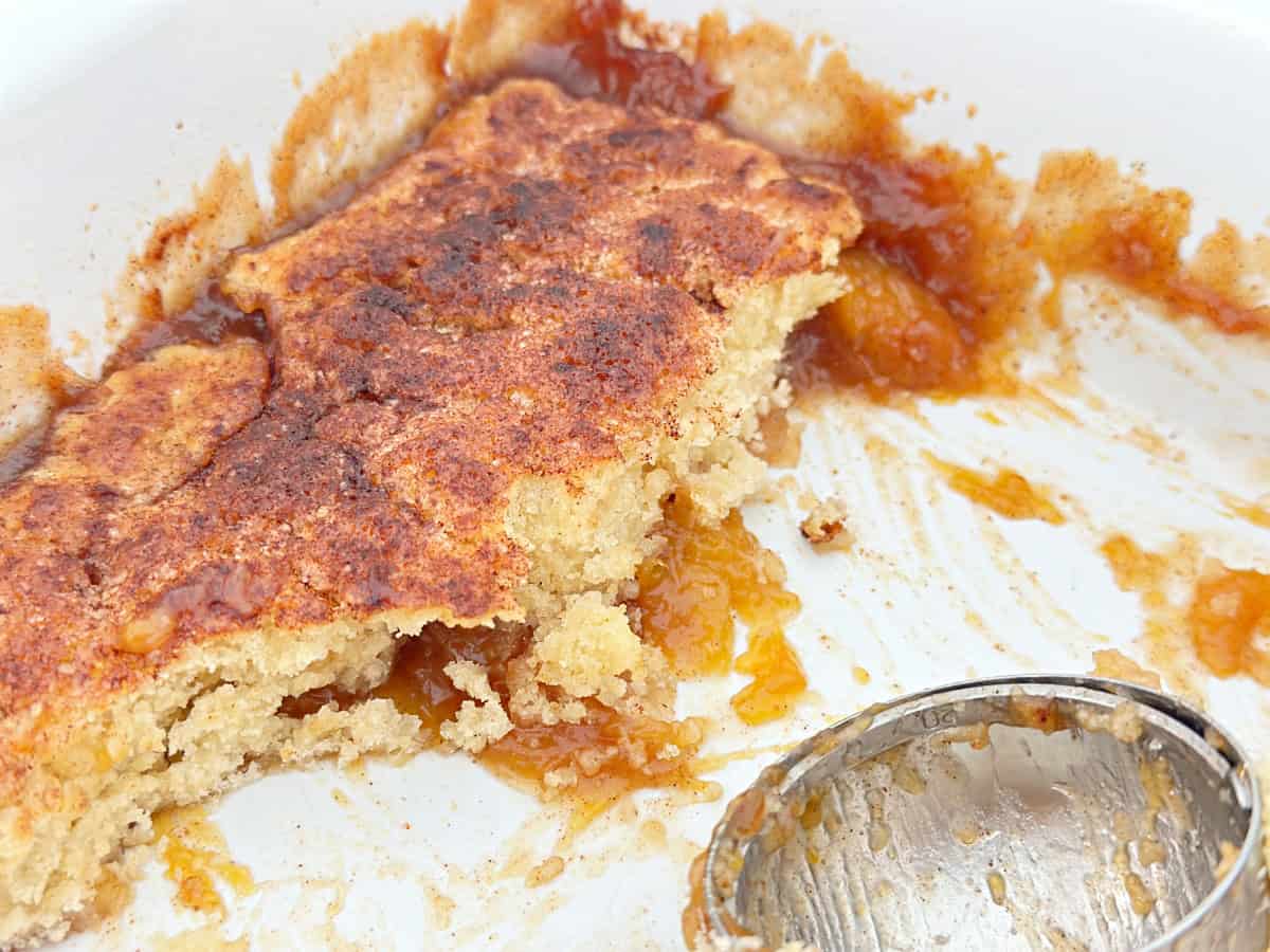 Leftover peach cobbler with biscuit topping.