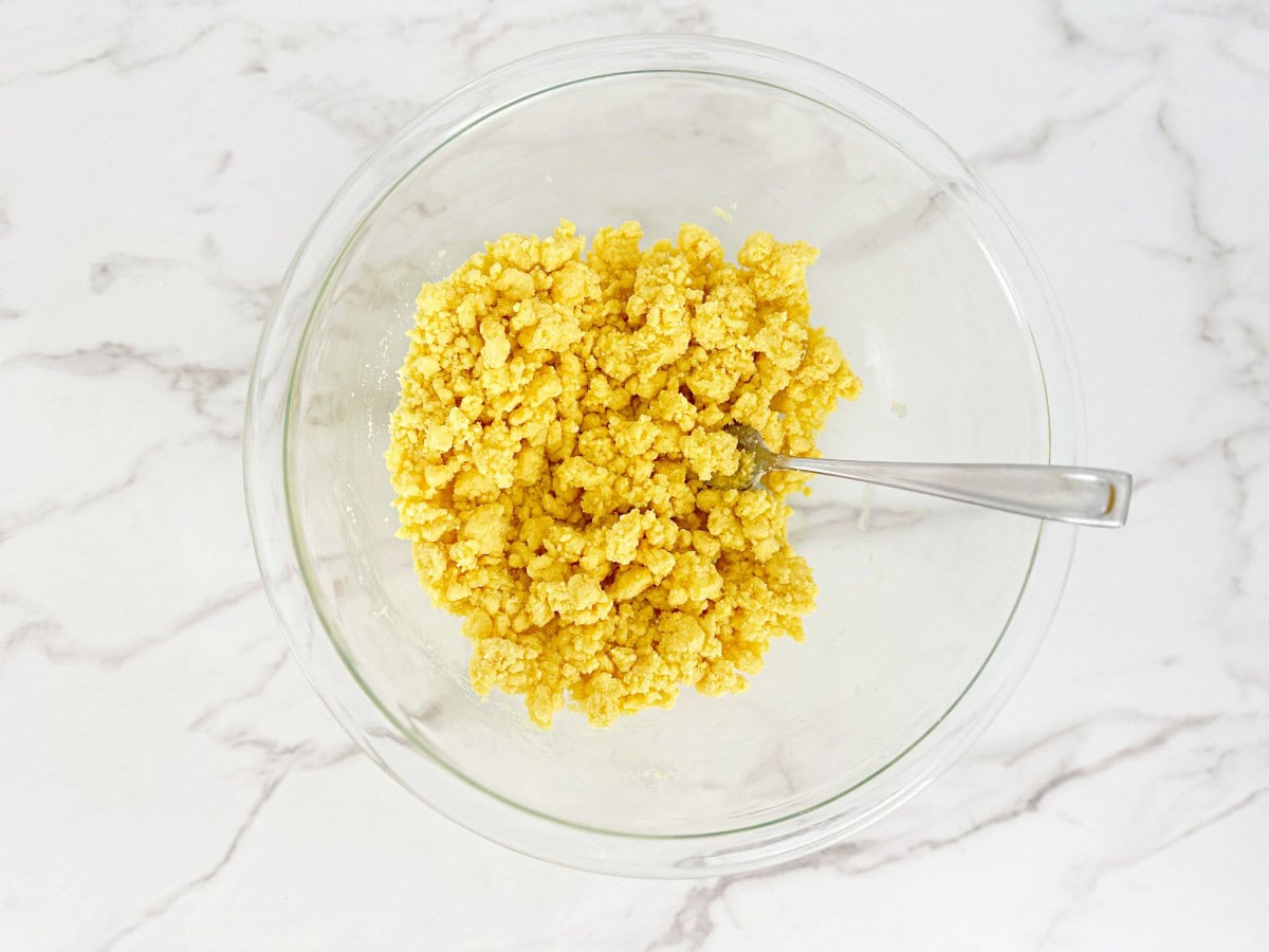 Down view of glass bowl with cake mix crumble topping.