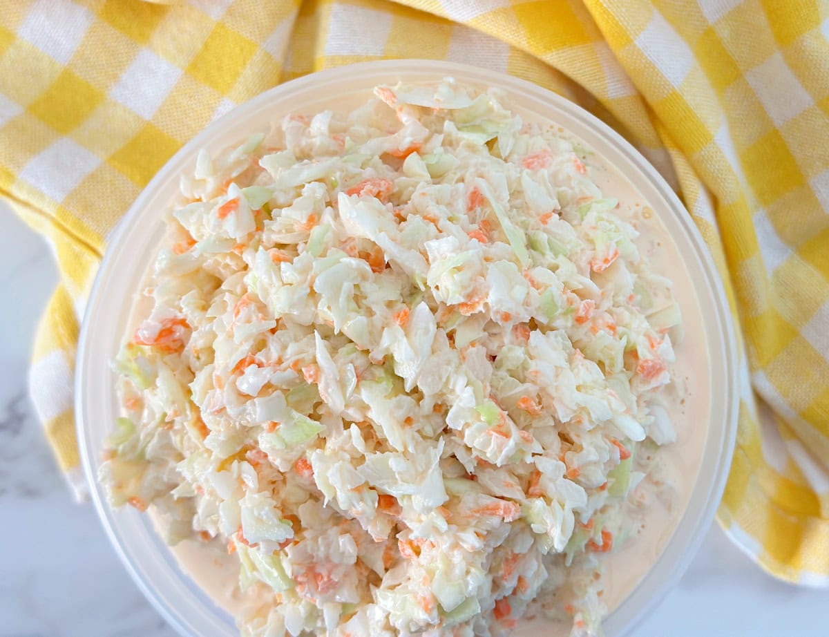 KFC coleslaw copycat recipe in a plastic container.