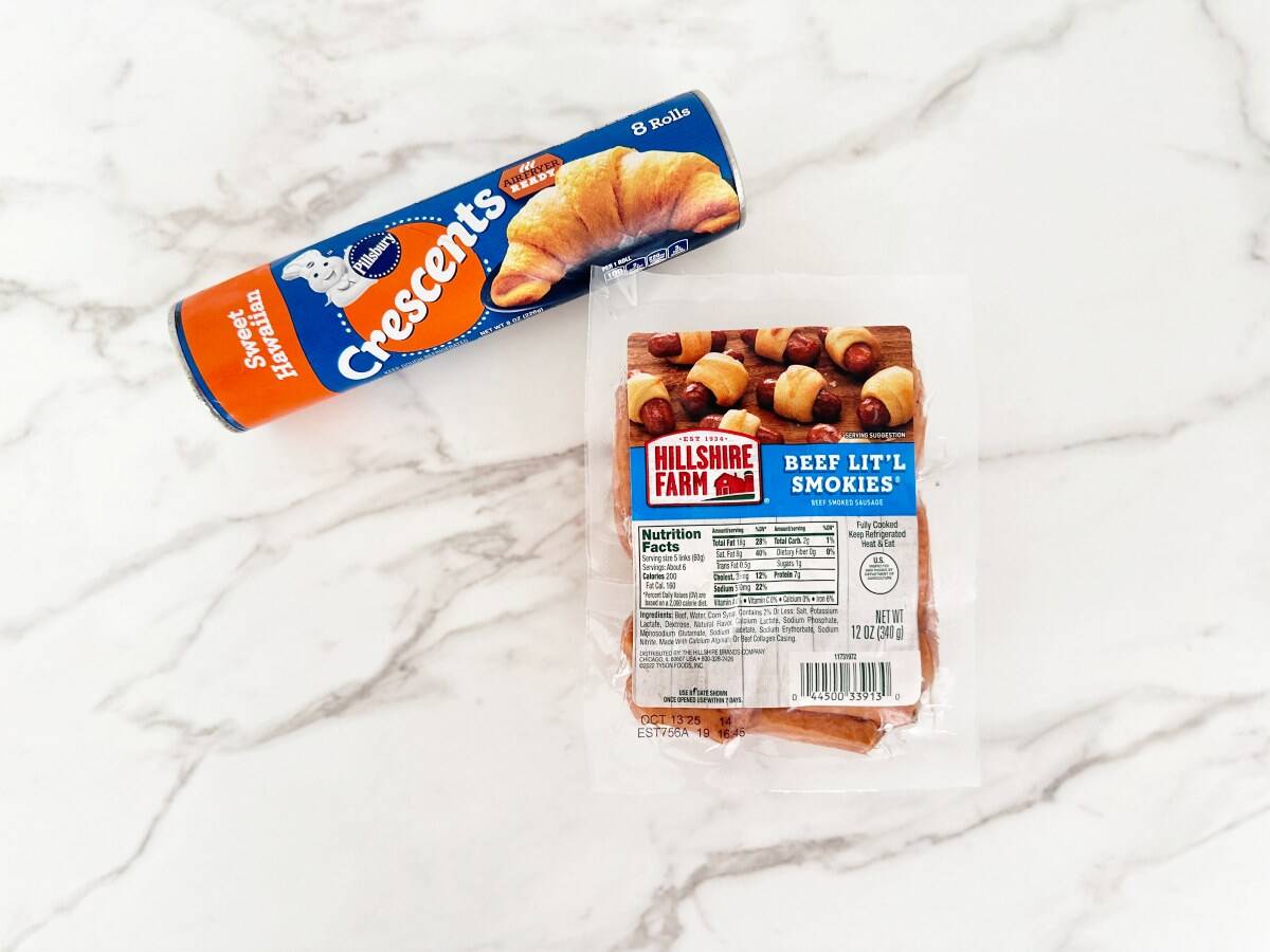 Crescent roll dough and lit'l smokes in their packaging.