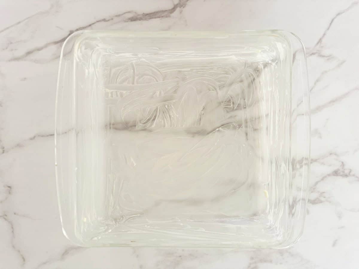 Buttered greased glass baking dish, down view.