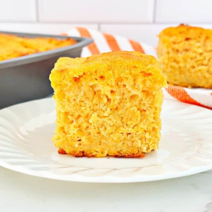 Sweet potato butter swim biscuit on a white plate.
